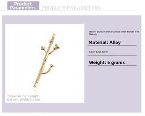 Detailed view of branch-shaped alloy hair clip with small flower buds in silver and gold