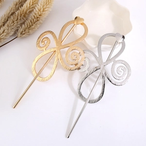 Set of minimalist gold and silver hollow spiral hairpins with heart design on top