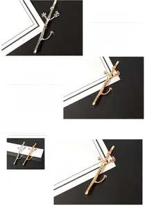 Detail of plum blossom branch hair clip with triple gold vacuum plating finish