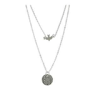 Detail view of double-layered silver necklace with bird and textured disc pendants