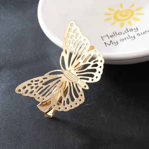 Elegant gold hollow butterfly hair clip with geometric cutout design for women