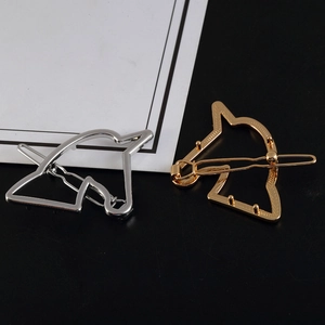 Hollow unicorn hair clips set in gold and silver finish with minimalist metal line design