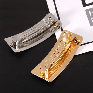 Minimalist rectangular metal spring hair clips set in polished gold and silver finishes