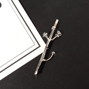 Silver flower branch alloy hair clip with detailed bark texture for stylish women accessories