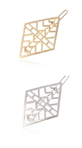 Detailed close-up of hollow diamond geometric hair clips in gold and silver metal finishes
