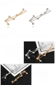 Détail des barrettes Grande Ourse dorées et argentées avec cristaux brillants