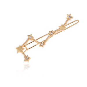 Gouden haarspeld Noordster met witte strass steentjes op een elegante metalen clip