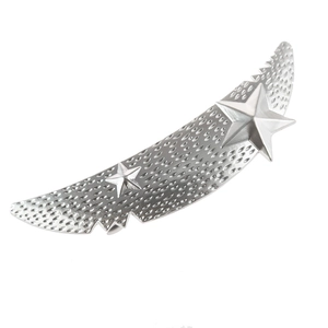 Detailed view of silver matte feather-shaped hair clip with engraved stars on metal