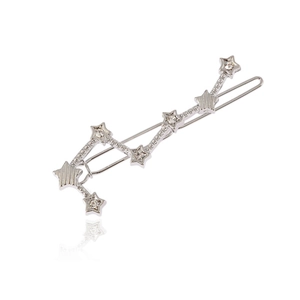 Barrette à cheveux étoile argentée avec strass blancs et design constellation