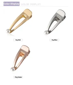 Detail view of matte finish metal duckbill hair clips with elegant pearl inlay set