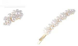 Close-up detail of white faux pearls on a gold metal hair clip for elegant hair styling