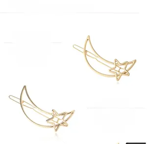 Polished gold alloy hair clip featuring hollow crescent moon and star design elements