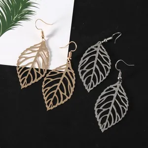 Minimalist hollow leaf drop earrings in gold and silver finish with hook design
