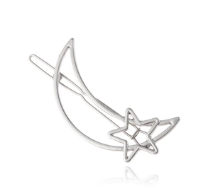 Detailed close-up of a silver hollow moon and star hair clip on a clean white background