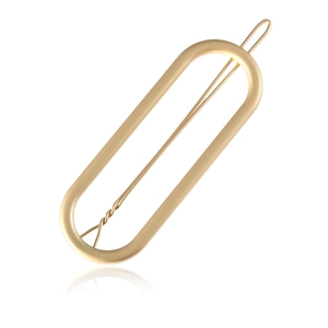 Minimalist matte gold oval hollow hair clip with elegant metal spring closure for women