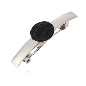 Barrette en métal argenté avec une pierre turquoise ronde à texture marbrée