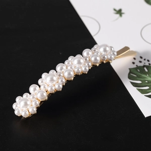 Elegant pearl hair clip with gold alloy base and glossy white imitation pearls