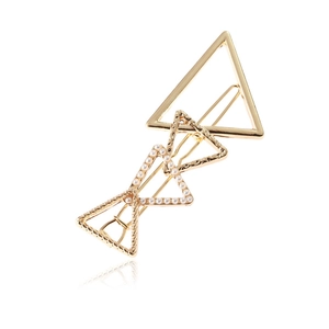 Golden geometric hair clip with overlapping triangles and elegant white pearls for women