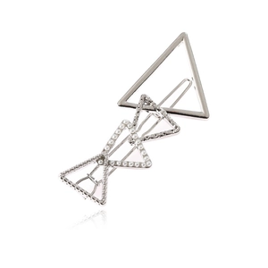 Exaggerated silver geometric hair clip with layered triangles and faux pearls