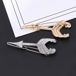 Sparkling cupid arrow hair clips in silver rhinestone and polished gold alloy finish