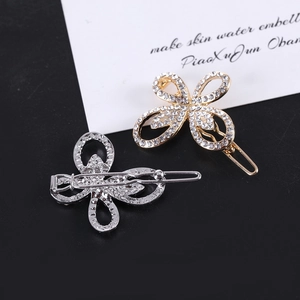 Funkelnde Schmetterling Haarspangen mit Strassbesatz in Gold und Silber Optik