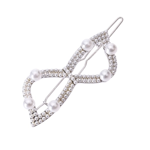 Elegant silver bow hair clip with faux pearls and hollow design for women styling