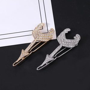 Sparkling rhinestone cupid arrow hair clips in gold and silver alloy finish
