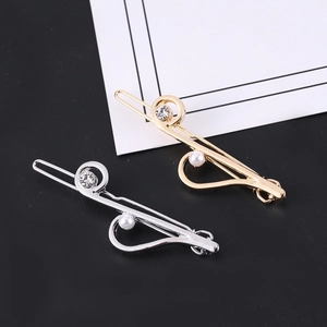 Polished musical note hair clips with white pearls and crystals in gold and silver finish