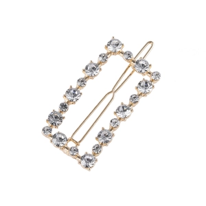 Gold rectangular hair clip featuring elegant pearls and rhinestones on a white background