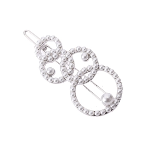 Eleganter silberner Haarschliff mit geschichteten Kreisen, weißen Perlen und Strass