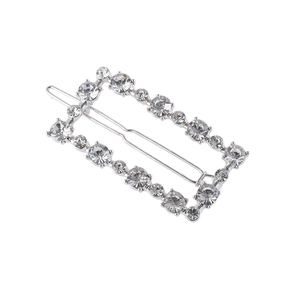 Elegant silver rectangle hair clip with shimmering rhinestones on a white background