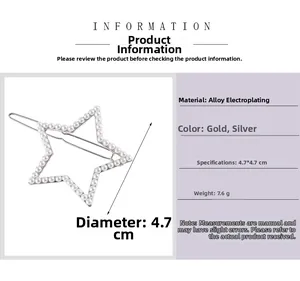 Barrette en forme d'étoile avec perles et strass montrant les dimensions 4,7 cm