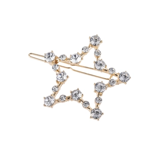 Barrette à cheveux étoile dorée sertie de strass brillants sur fond blanc épuré