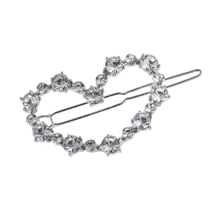 Pince à cheveux coeur creux avec perles et strass brillants sur base en métal argenté