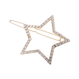 Barrette étoile dorée avec cristaux scintillants et design géométrique ajouré