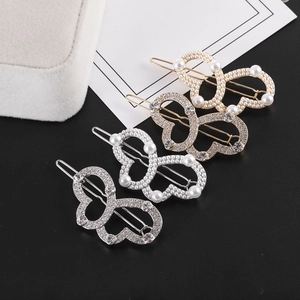 Set di 4 eleganti fermagli per capelli a farfalla con perle e strass in oro e argento
