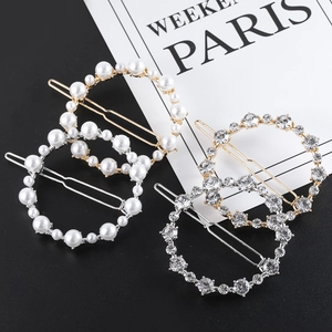 Lot de 4 barrettes rondes en alliage avec perles et strass en finitions dorée et argentée