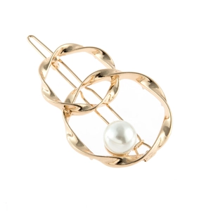 Minimalist gold hair clip with twisted double rings and a white pearl accent