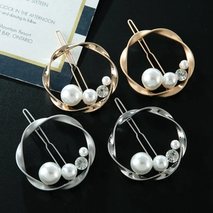 Barrettes à cheveux en alliage doré et argenté avec perles et strass sur fond noir