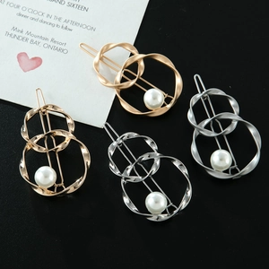 Minimalist twisted double ring hair clips with white pearls in gold and silver finishes