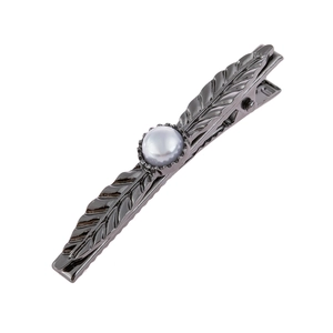 Minimalist leaf-shaped hair clip with grey pearl and dark gunmetal metallic finish