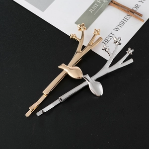 Chic gold and silver branch hair clips with star accents for women's fashion styling