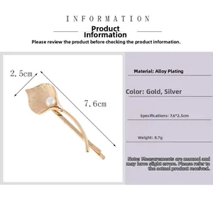 Detail view of a gold tulip hair clip with pearl showing dimensions 7.6cm by 2.5cm