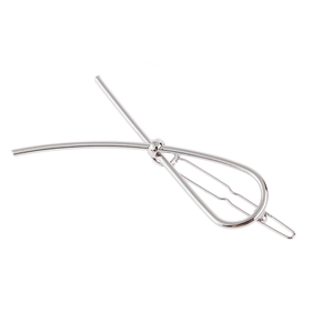 Minimalist silver metal bow hair clip with polished mirror finish for women's hairstyle