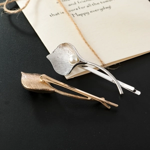 Minimalist gold and silver tulip hair clips with pearls in a dual set for women