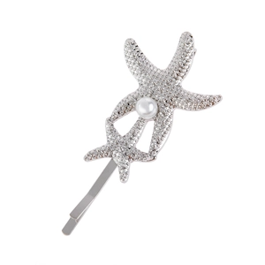 Barrette étoile de mer argentée avec strass brillants et perle blanche centrale