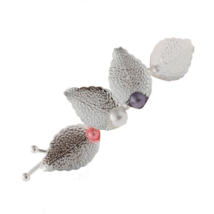 Elegant vintage silver leaf hair clip with multicolored pearls on a clean white background