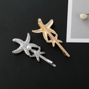 Barrettes étoile de mer dorées et argentées avec perles blanches et texture marine