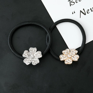 Lot de deux élastiques à cheveux fleurs avec strass en finitions argent et or