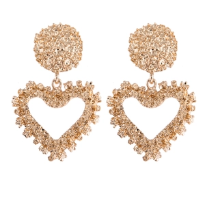 Golden textured hollow heart earrings with hammered surface detail and round stud tops